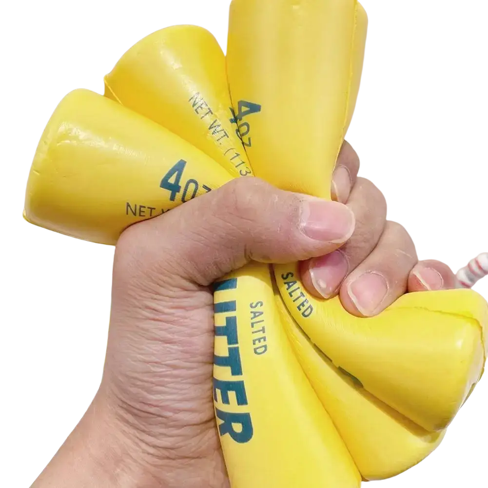 Yellow salted butter stick slow rising squeeze toy shaped stress ball with blue text labeling