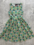 Vintage 1950s sleeveless mint green cotton midi dress with a vibrant multicolored butterfly print pattern