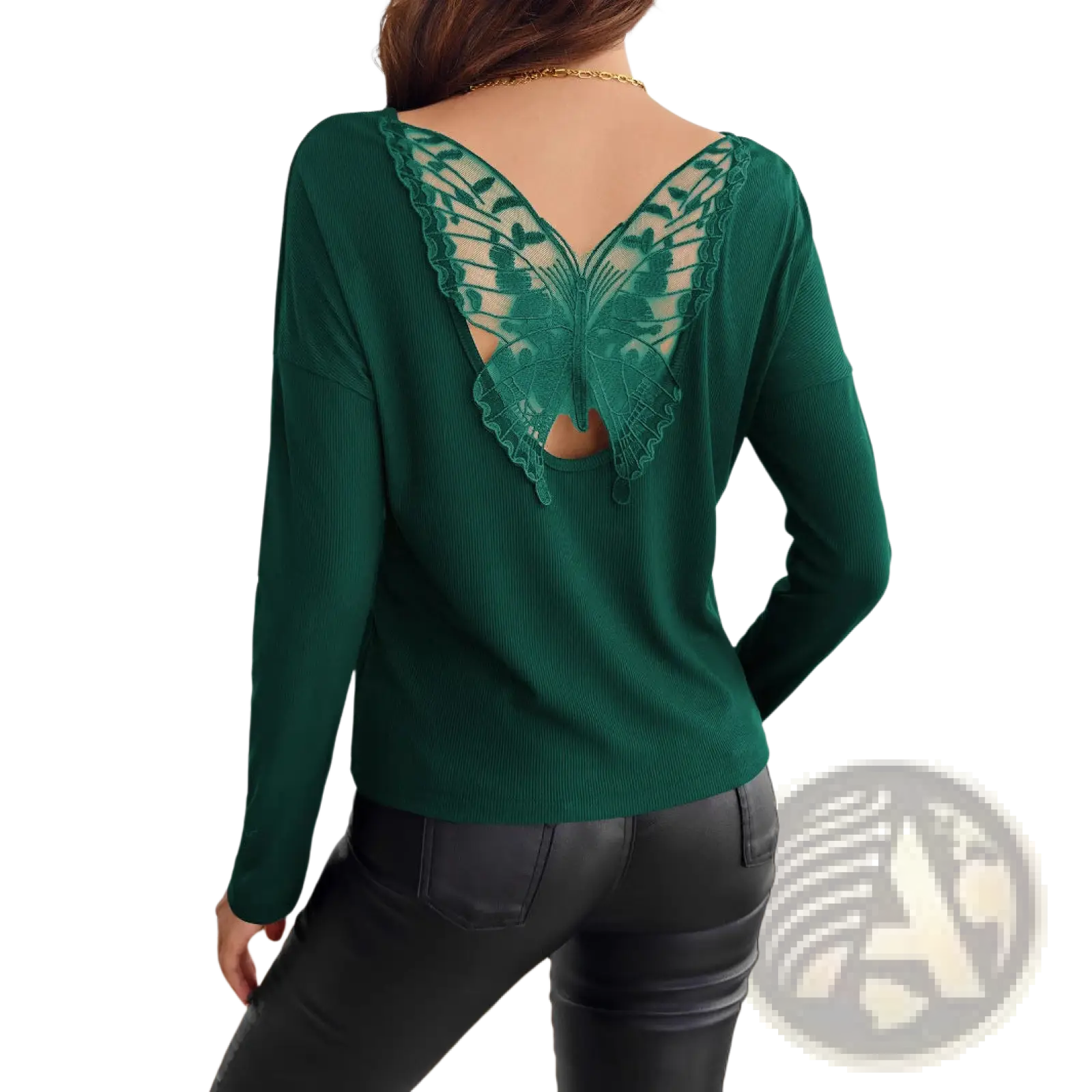 Emerald green ribbed long sleeve knit top shown from the back featuring intricate butterfly lace detail