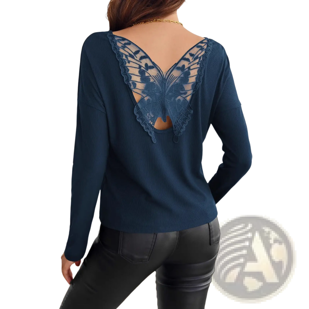 Navy blue ribbed long sleeve sweater shown from the back featuring a detailed butterfly lace design