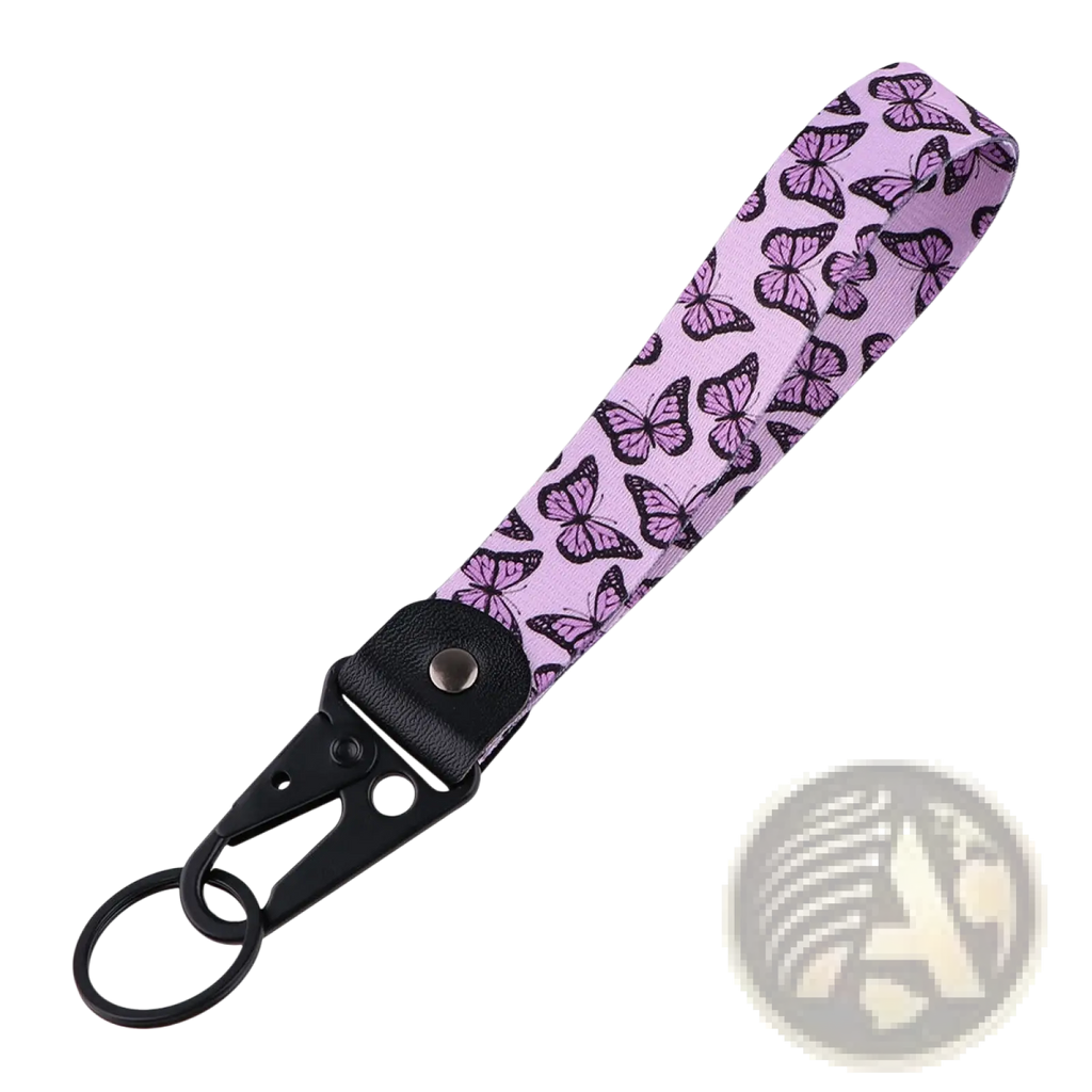 Butterfly wrist strap keychain with lavender fabric and black-outlined butterflies attached to a black metal clip
