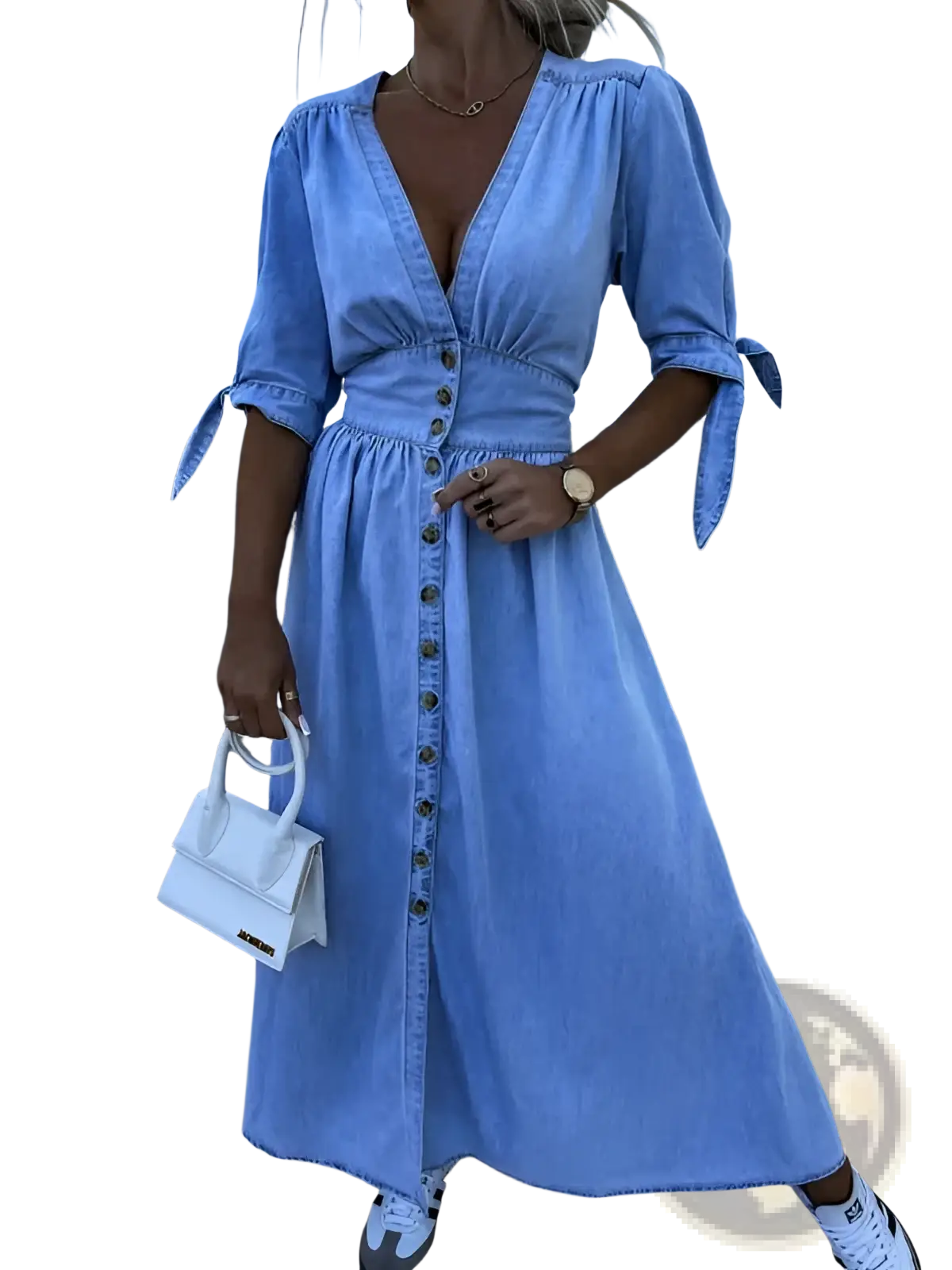 A light blue denim midi dress with v-neck button front closure and tied cuffs featuring puff sleeves