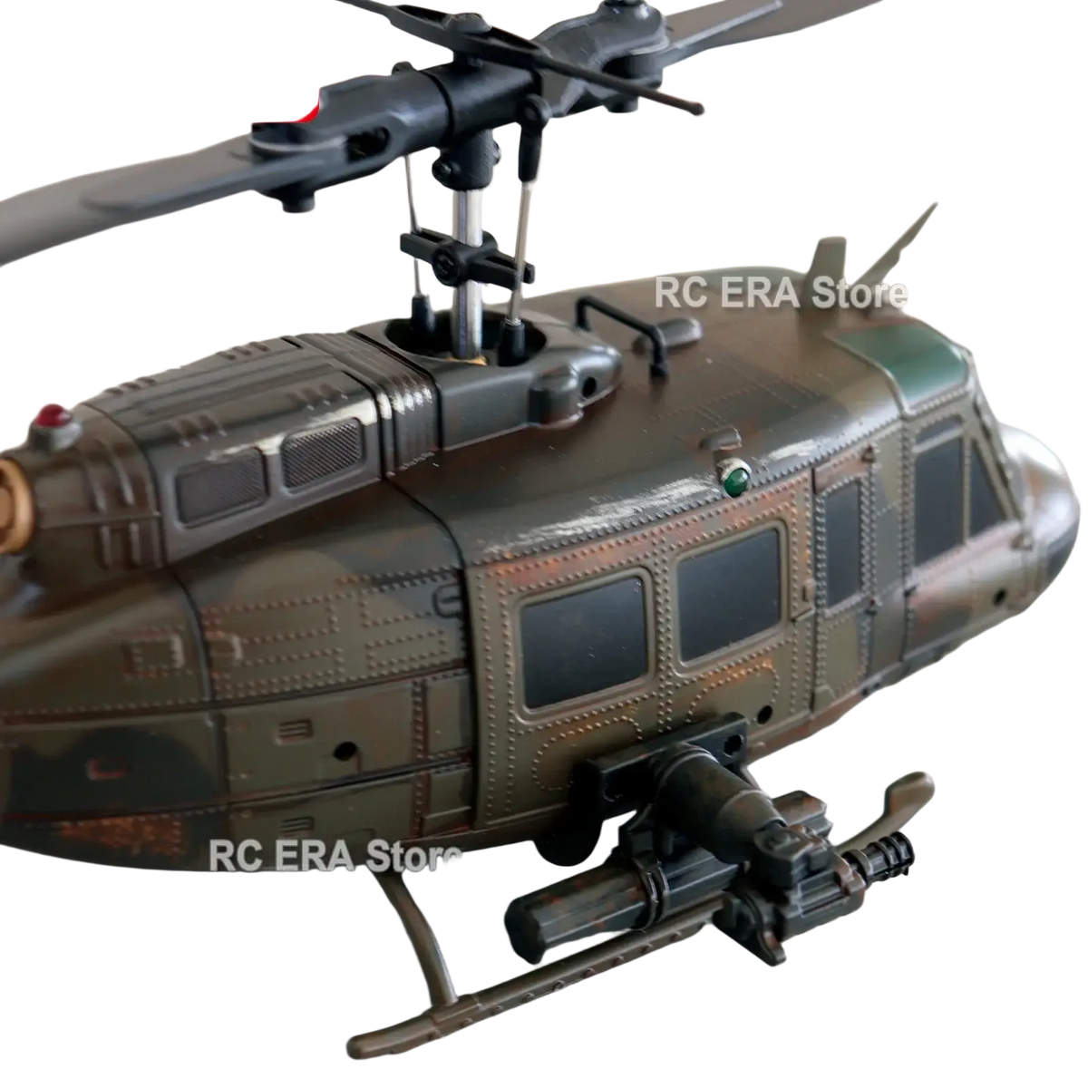 C032 uh1 camouflage weathered remote control helicopter with metal-like finish and mounted gun for realistic play