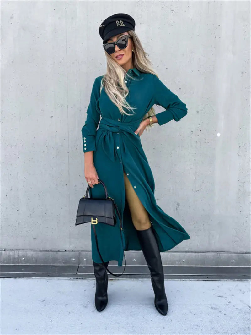 Teal long sleeve belted maxi cardigan dress with waist tie featuring a cinched waist and side slit.