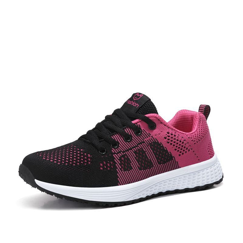 Black and pink mesh fly woven sneakers with breathable knit material and a white midsole designed for athletic use.
