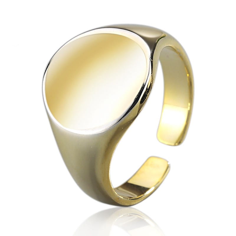 Gold-toned adjustable minimalist signet ring with a smooth oval-shaped face and polished metallic band.