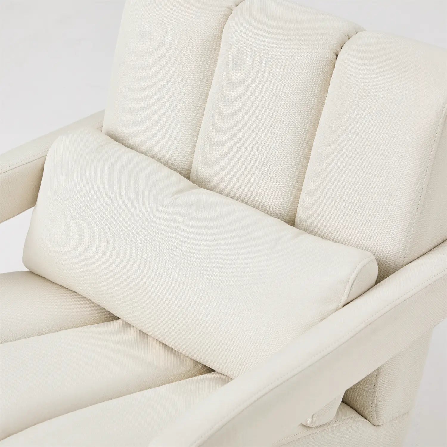 Cream-colored faux leather modern linen accent chair with segmented backrest and matching cushion for beige living room.