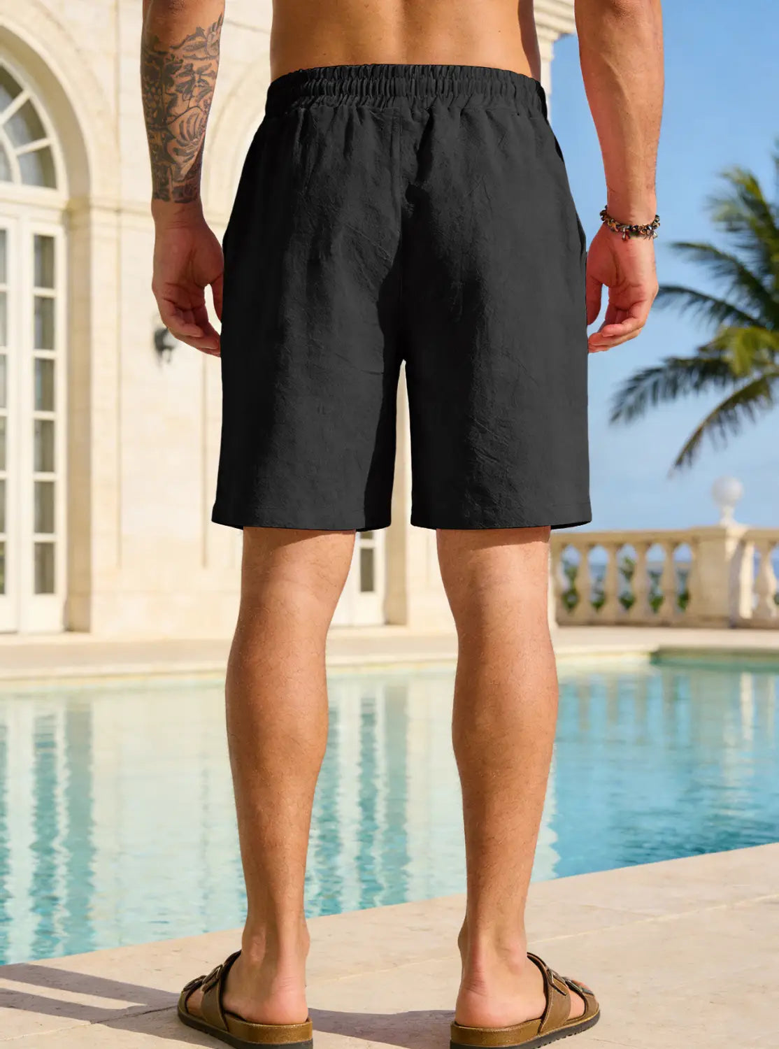 mens cotton linen drawstring shorts in black lightweight linen with an elastic waistband designed for comfort and casual wear