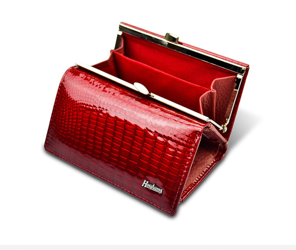 Red crocodile-patterned leather trifold wallet with glossy finish and gold-toned clasp in retro style.