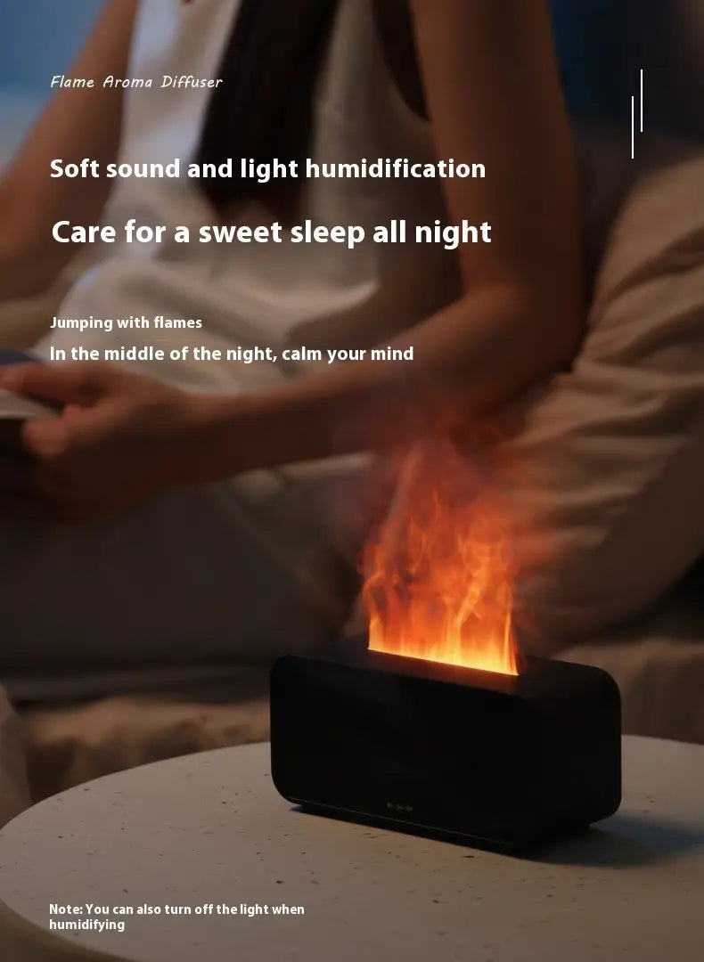 Black rectangular flame diffuser humidifier with jellyfish mist effect displaying realistic orange flames rising from its top.