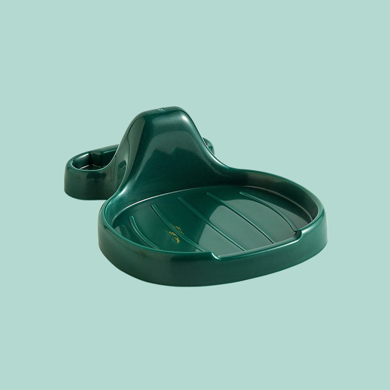 Dunkelgrüner Keramik-Topfdeckelhalter für Arbeitsplatten-Organizer-Regal mit geschwungenem ergonomischem Design und integrierter Hakenbefestigung für die Wandmontage.