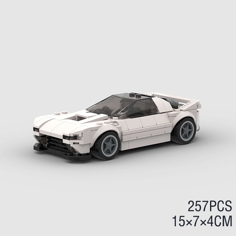 Modelo de coche deportivo estilo LEGO de Mazda RX7 FC3S en blanco, con neumáticos negros y cabina transparente, como pieza de construcción para exhibición de carreras de superdeportivos.