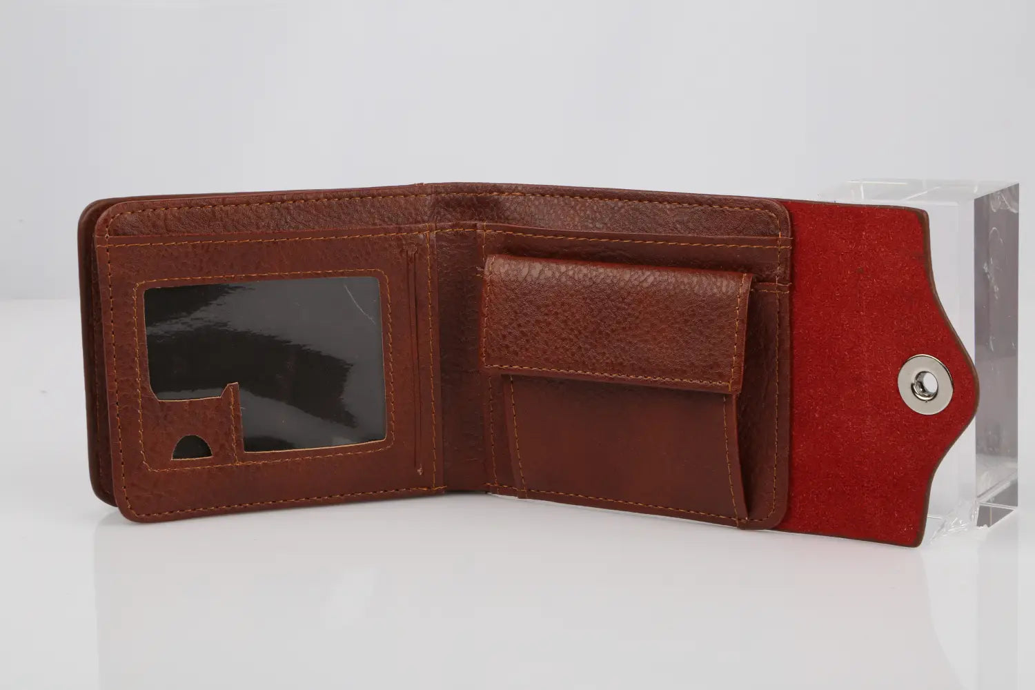 men’s slim RFID blocking bifold wallet in brown PU leather with a contrasting red flap and silver-toned snap button closure.