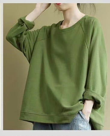 Olive green women’s relaxed oversized cotton blend pullover sweatshirt with long sleeves and rolled cuffs in a casual fit.