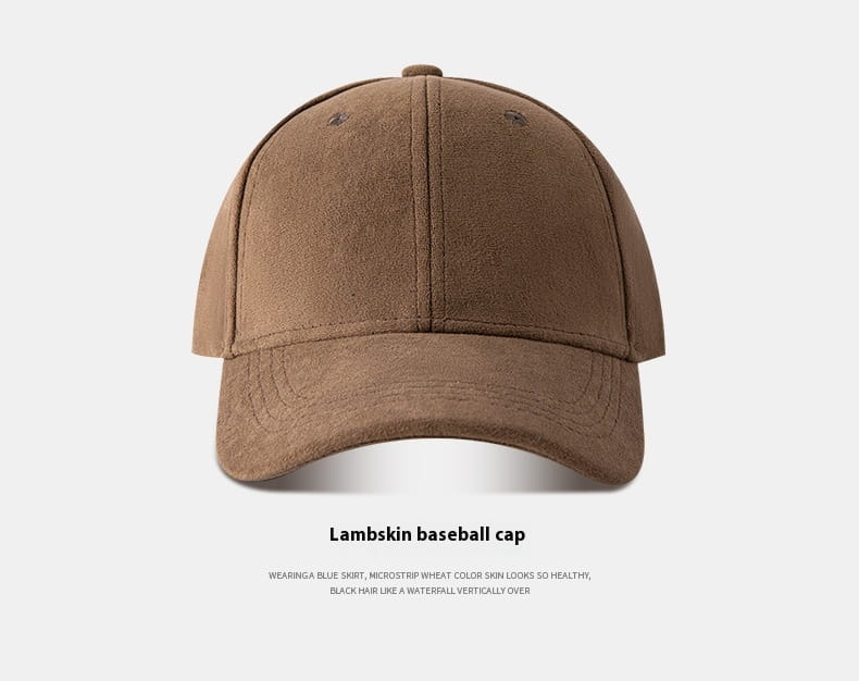 A brown lambskin suede baseball cap with a classic six-panel design and stitched brim soft minimalist adjustable hat.