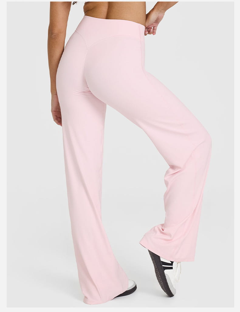 Slimming yoga pants high waisted straight leg in pink with flared design and smooth stretchy fabric.