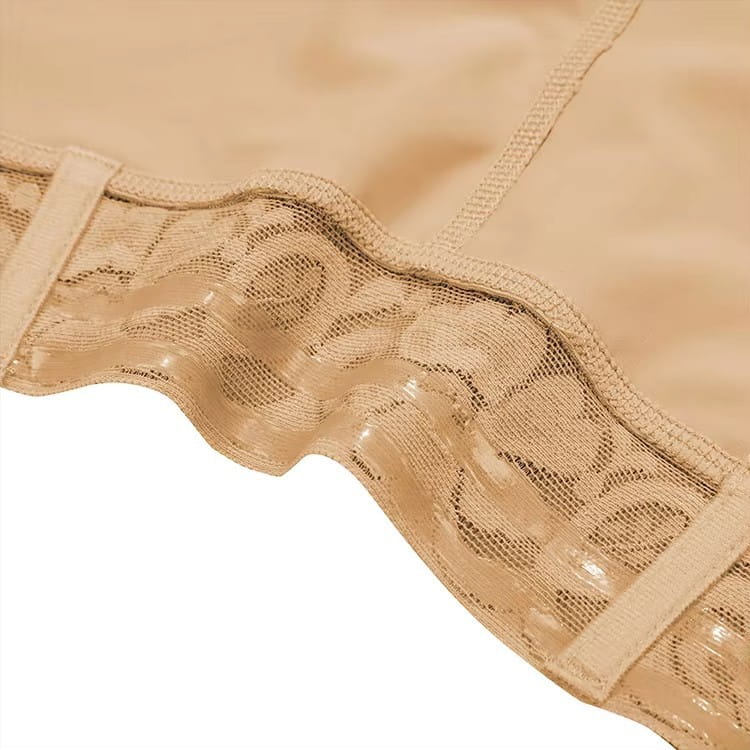 Beige lace trim with a delicate floral pattern stitched along the edge of high waist shapewear shorts lace butt enhancer fabric.
