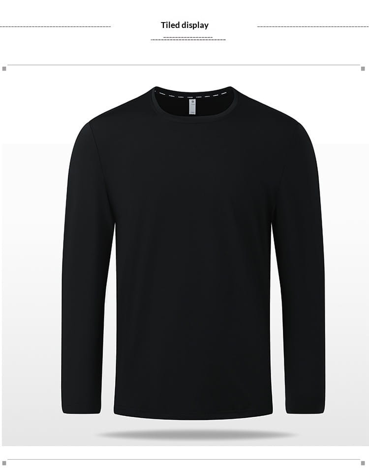 Camiseta de manga larga y cuello redondo tipo crew sólida en color negro, confeccionada con una tela lisa con acabado uniforme.