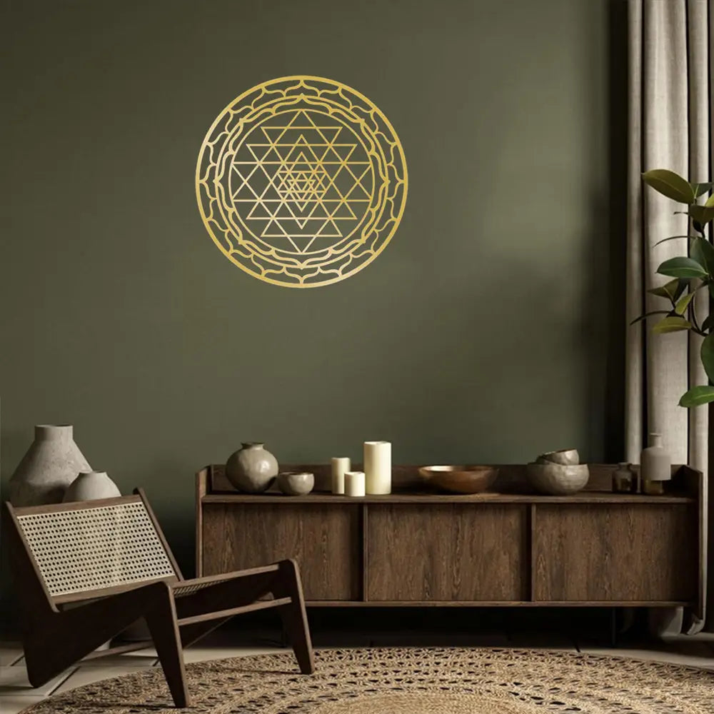 Gold-colored metallic sri yantra wall art featuring intricate geometric patterns for sacred geometry metal wall art decor.
