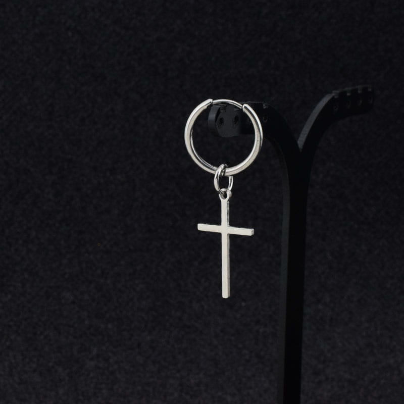 Minimalist stainless steel silver hoop earring with a dangling cross pendant suitable for everyday wear.