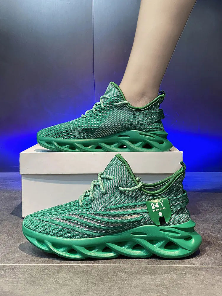 Vibrant green flyknit mesh platform running shoes for men featuring a chunky translucent sole and matching laces.
