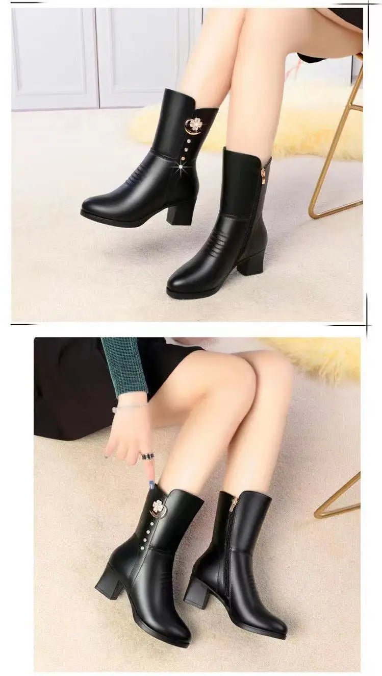 Black leather ankle martin boots with a block heel and decorative floral brooch on the side for women.