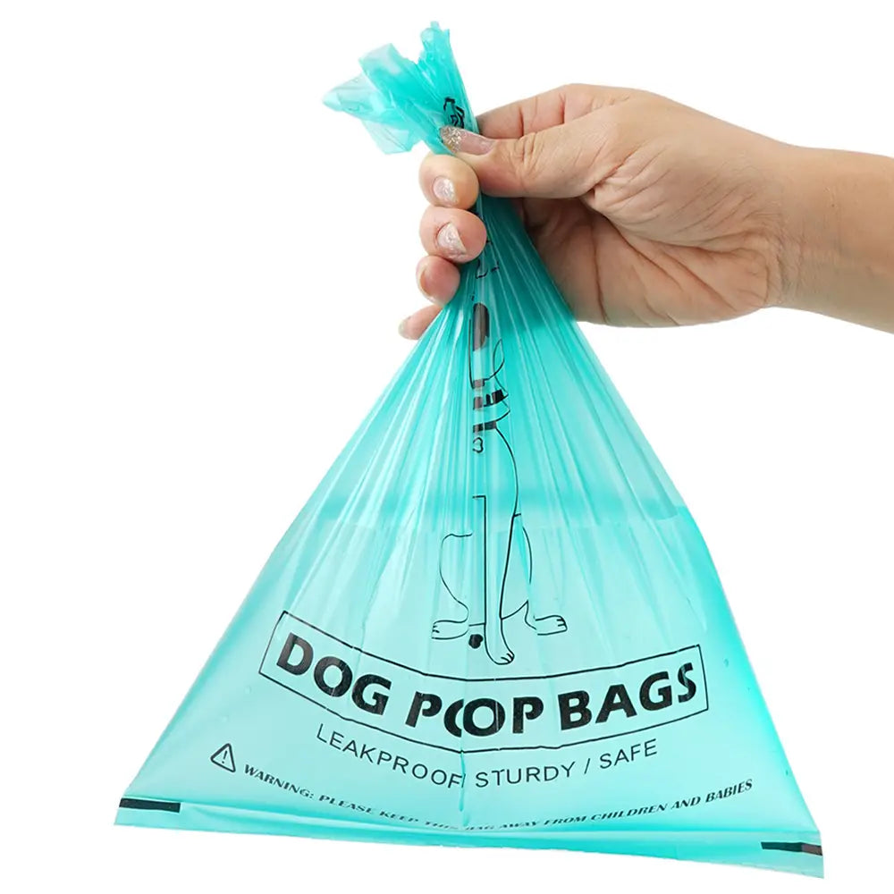 A translucent turquoise biodegradable plastic dog waste bag with a black printed design and text from the back side for thickened pet poop disposal.