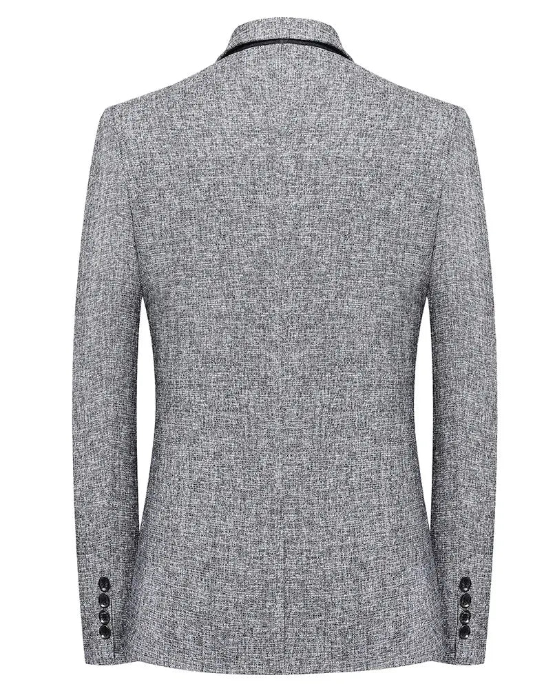Anzugblazer mit schmaler Passform und einem Knopf, aus grauem, strukturiertem Stoff, mit schwarzen Knopfdetails und kontrastierender schwarzer Reversverzierung.