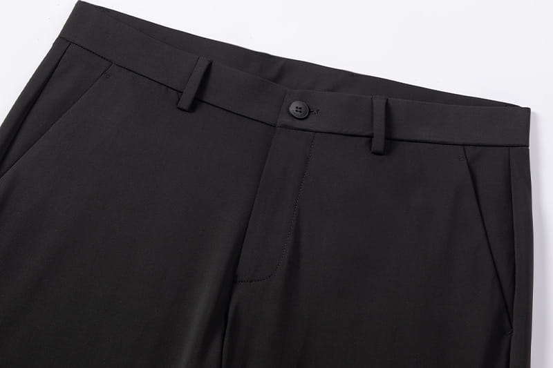 Black men plus size stretch casual trousers featuring a sleek minimalist design with matching belt loops.