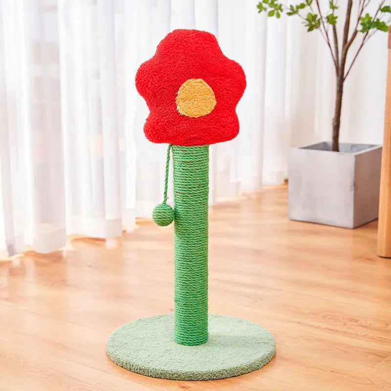 Roter Plüsch-Kratzbaum in Blumenform mit gelbem Zentrum und grünem, mit Sisal umwickeltem Pfosten, der einen kleinen hängenden Ball für die dauerhafte Nutzung als vertikales Katzenspielzeug aufweist.