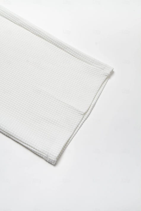 men’s slim fit waffle knit straight leg business trousers in white ribbed cotton fabric with a subtle textured weave