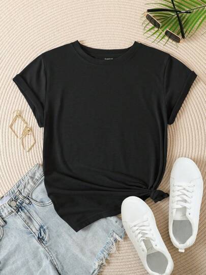 Velvet short sleeve casual tee in black velvet with a simple round neckline and a knotted hem.