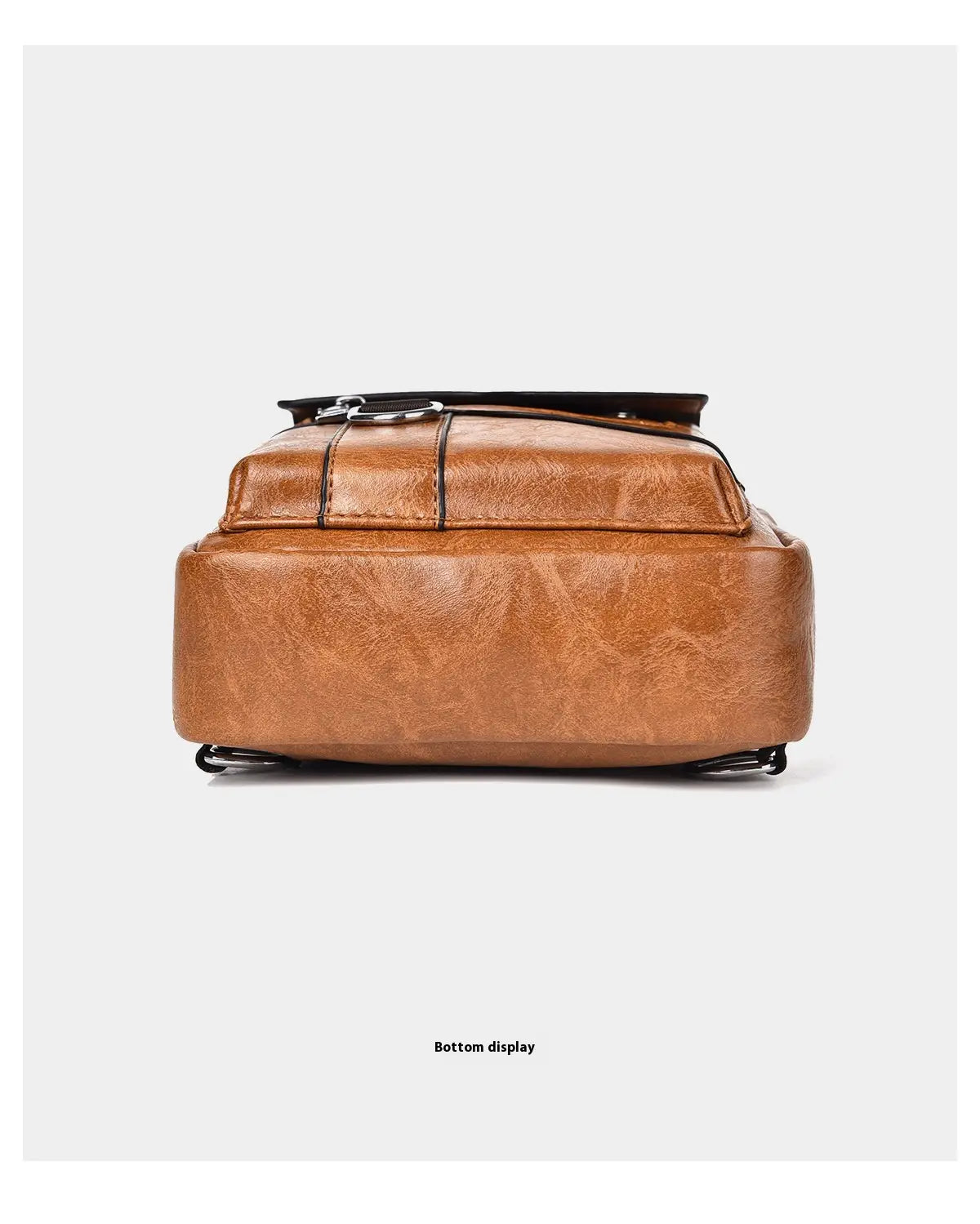 Brown leather backpack with black trim and zipper details for men’s retro waterproof faux leather crossbody chest bag.