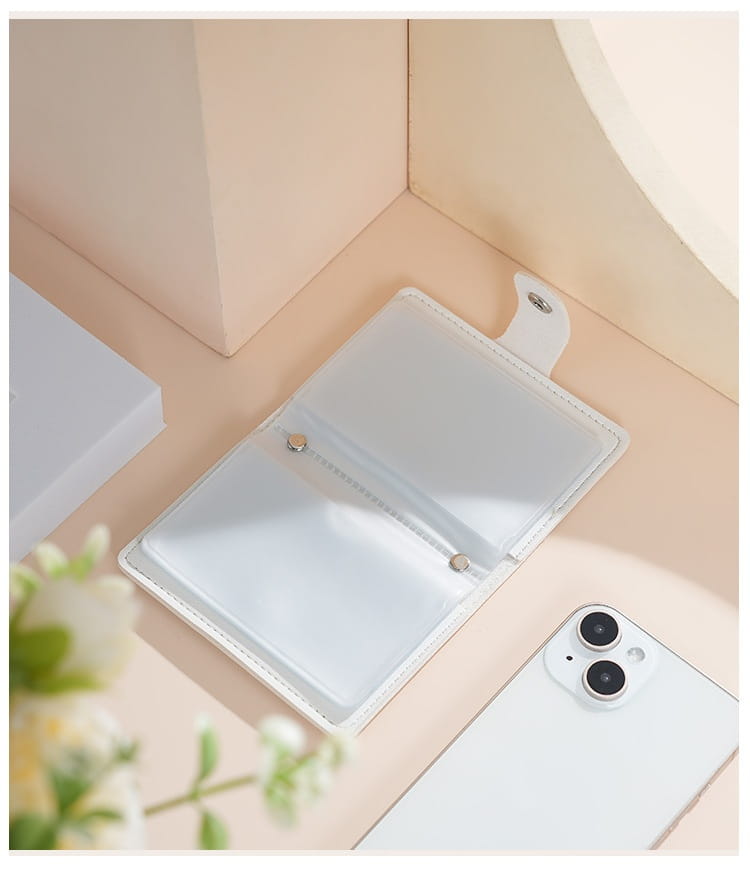 White leather vintage floral pu leather multi slot card holder wallet with clear card slots and silver toned hardware.