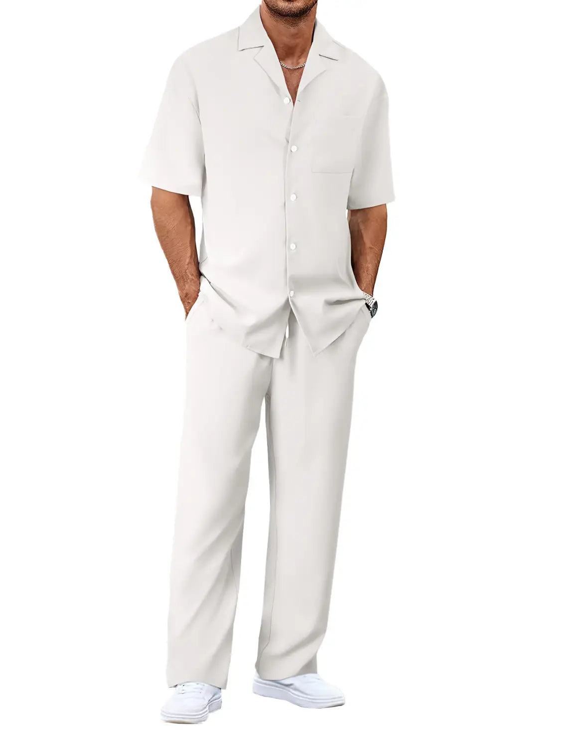 A crisp off-white short-sleeved button-up shirt with a classic collar paired with matching trousers in a men short sleeve casual suit set.