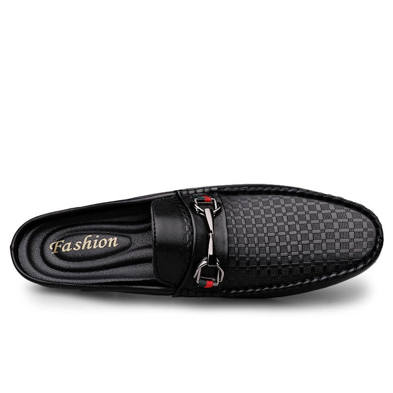 men’s leather mule loafer in black woven leather with silver horsebit buckle accented by red and green details.