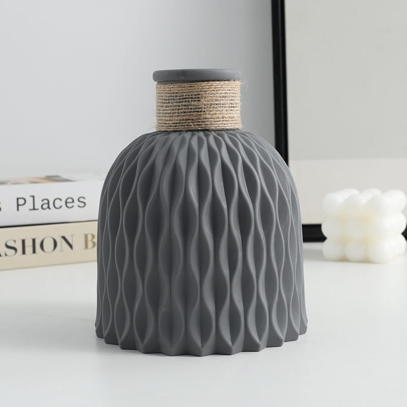 Gray ceramic vase with a natural twine-wrapped neck and textured wavy surface from a ceramic vase set with twine and wavy texture 4 pack.