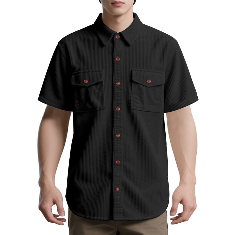 Loose black short-sleeved corduroy workwear shirt with red buttons and two chest pockets