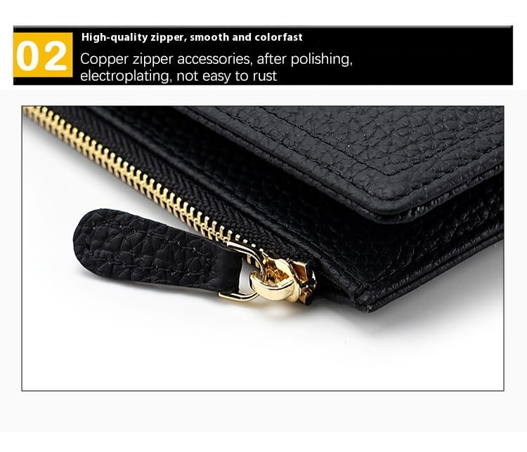 Black cowhide leather anti theft RFID long zip wallet with textured finish and gold-toned zipper and pull tab.