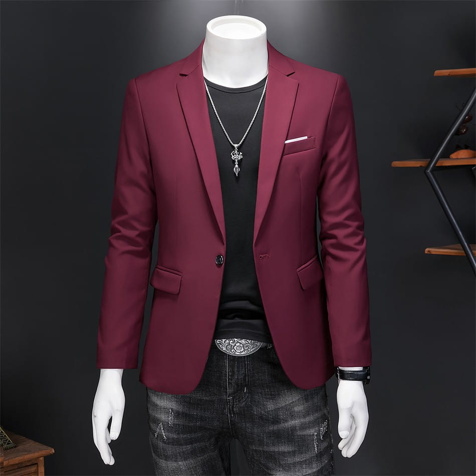 Chaqueta de vestir empresarial de pana granate con ajuste slim, corte a medida moderno y brillo sutil.