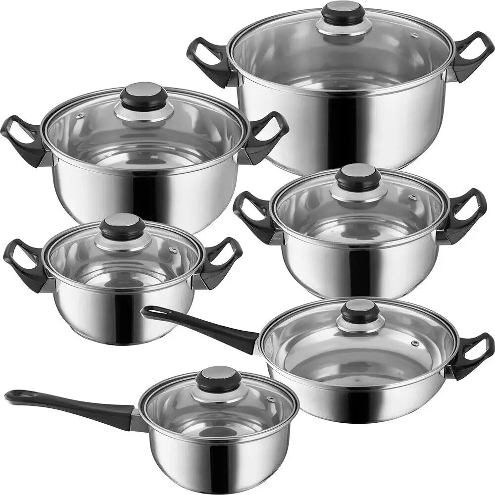 Set of stainless steel cookware pots and pans with black handles and glass lids in a 12 piece cookware set.