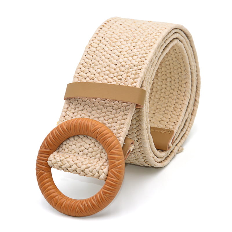 Beige woven elastic belt with a tan round buckle made from woven material.