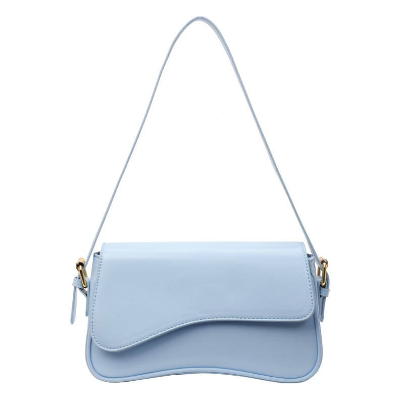 A light blue leather messenger bag minimalist crossbody organ bag with a smooth leather-like finish and gold-tone hardware.