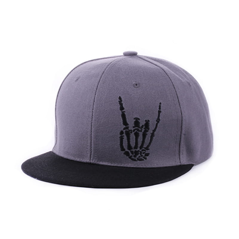 Gray snapback baseball cap with black brim featuring a black embroidered skeleton hand gesture on the front.