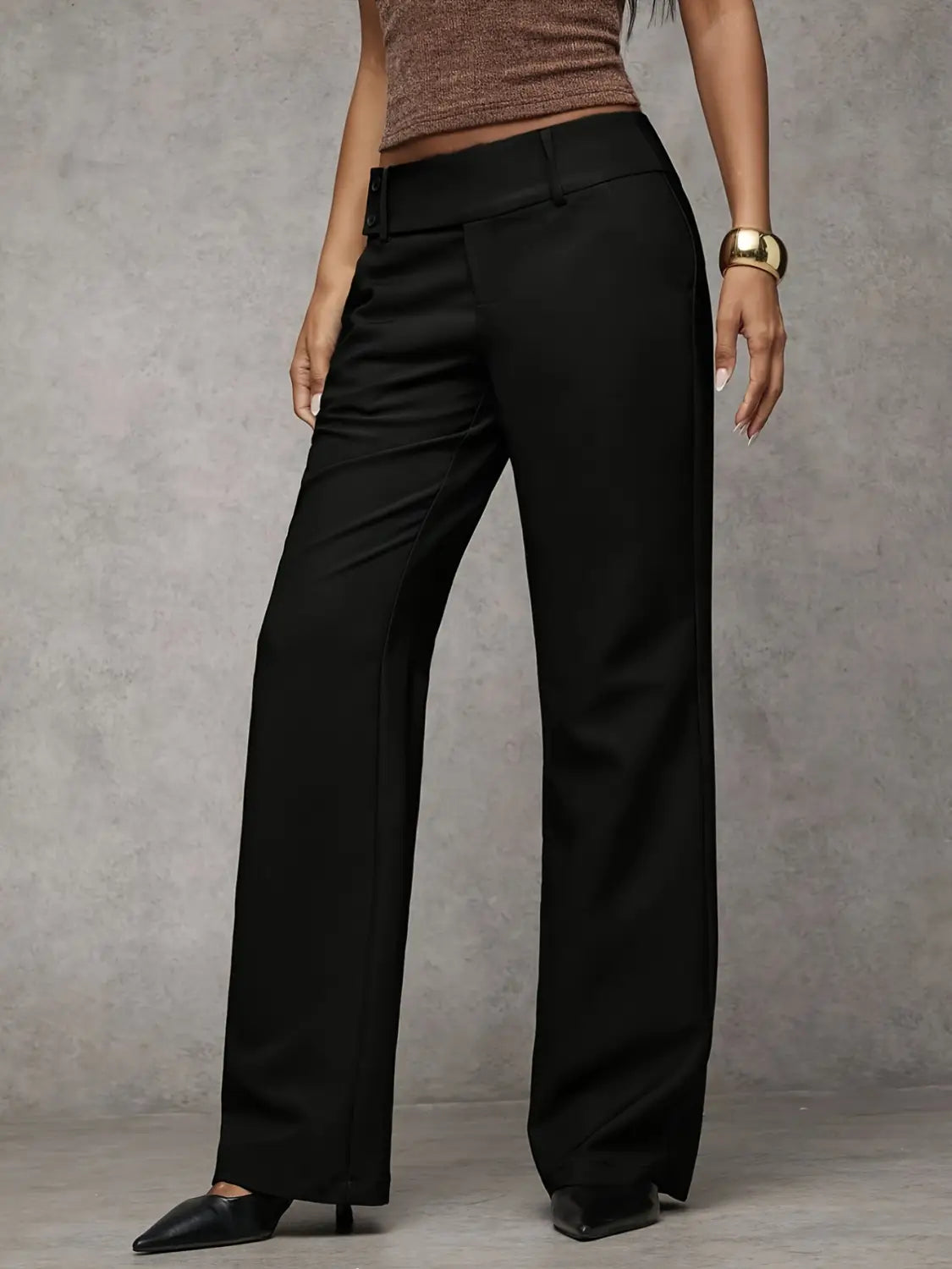 Black wide-leg high waist work pants with a sleek tailored fit and subtle creases suitable for casual wear.