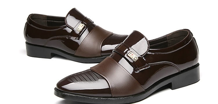 Men’s black patent leather lace-up dress shoes with glossy finish and gold-tone buckle for business and formal wear