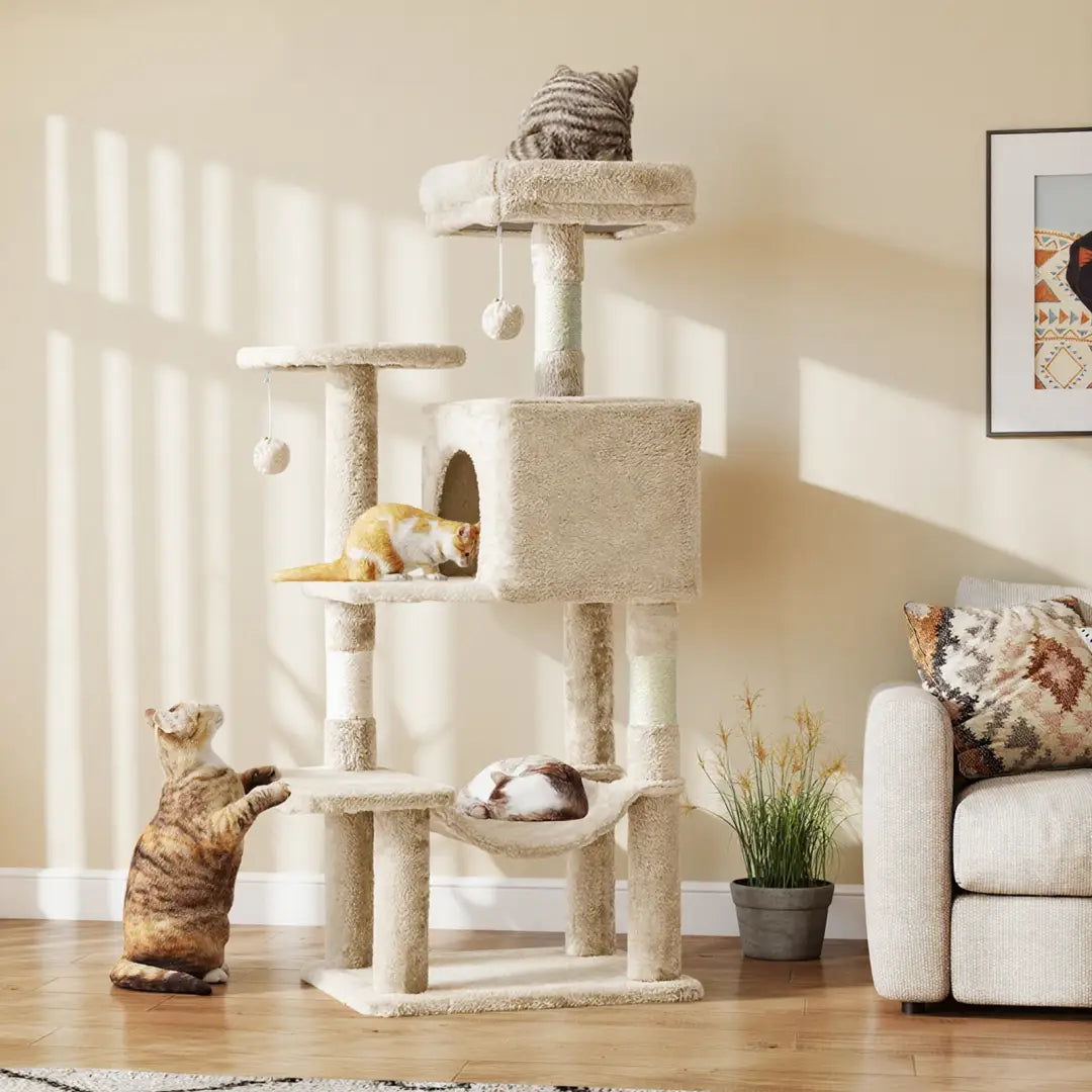 Beige 44 inch multi-level cat tree tower featuring sisal scratching posts, platforms, and a hammock for feline activity and rest.