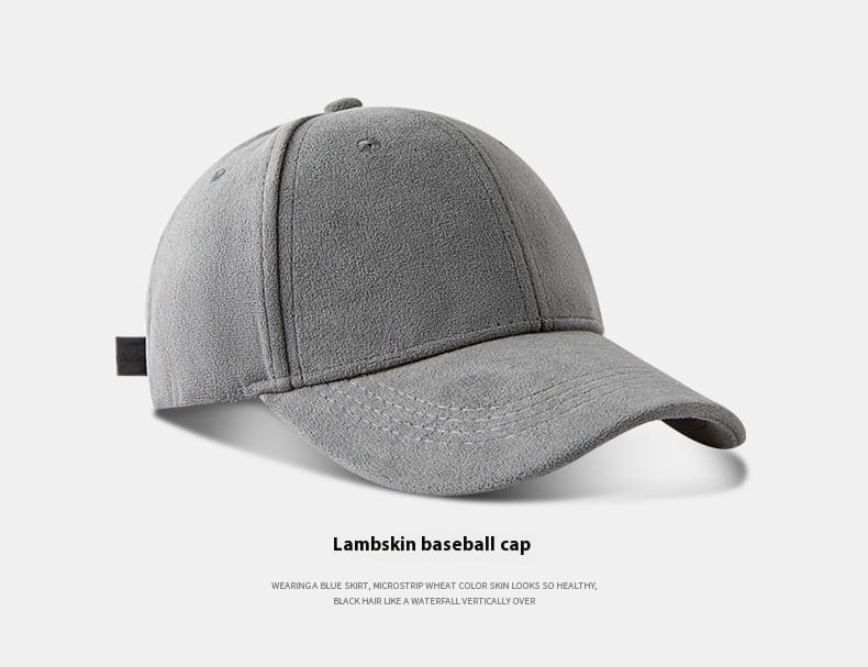Gray lambskin suede baseball cap with curved brim and stitched panels for a soft minimalist adjustable hat.