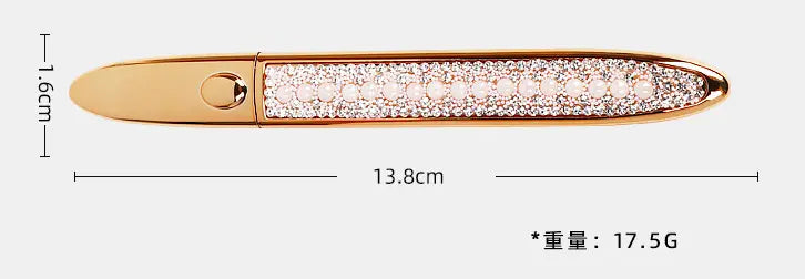 Rose gold self-adhesive eyeliner pen with a sparkling crystal-encrusted body and sleek metallic cap designed for waterproof false lashes application.