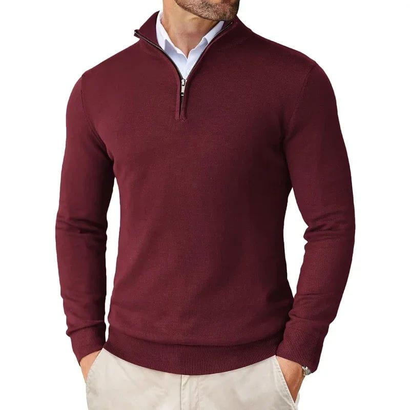 Suéter ligero de media cremallera para hombre en burdeos, con puños y bajo acanalados, elaborado con un material transpirable.